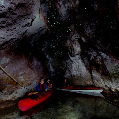 a raft next to a waterfall