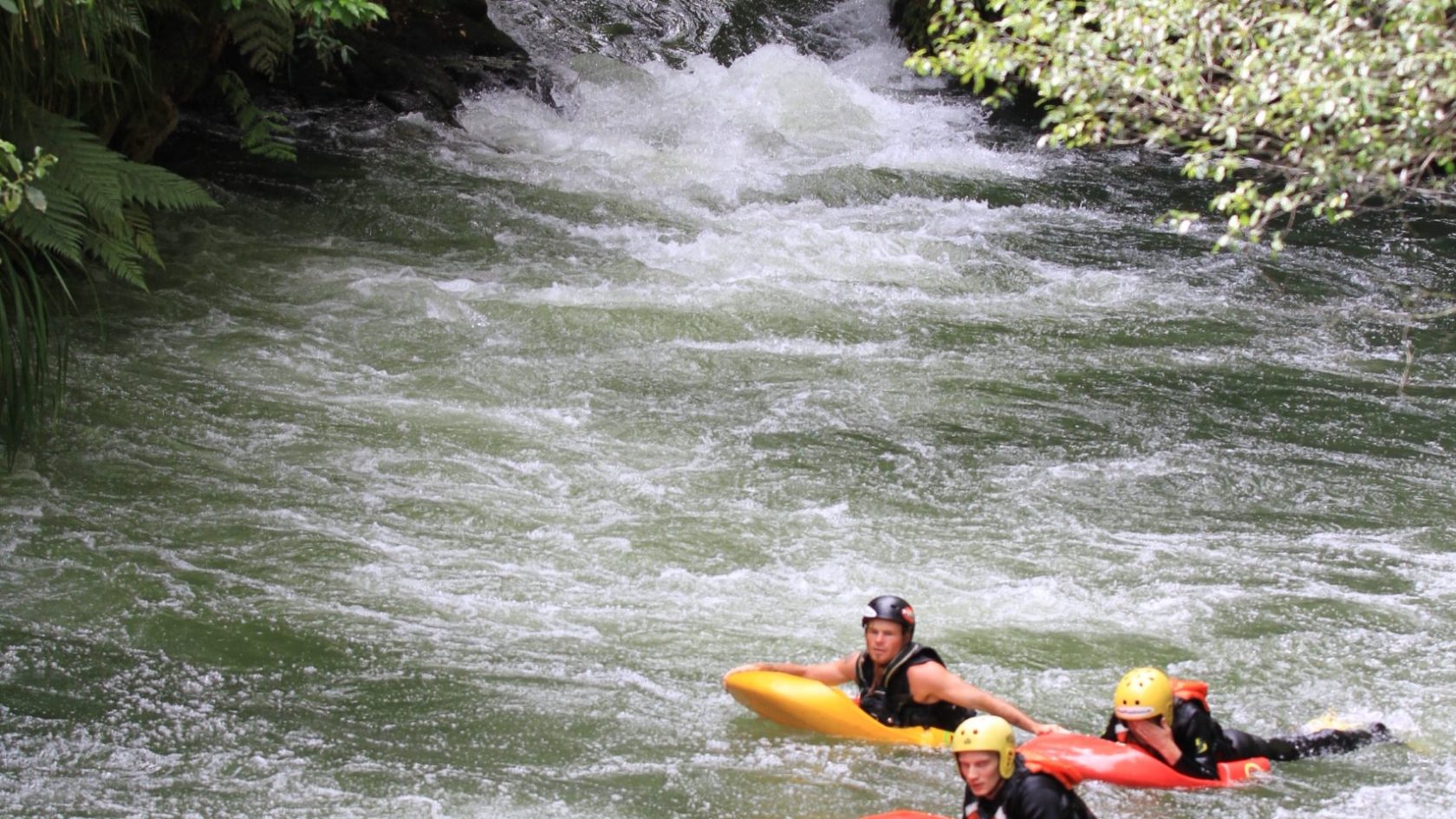 people floating down river