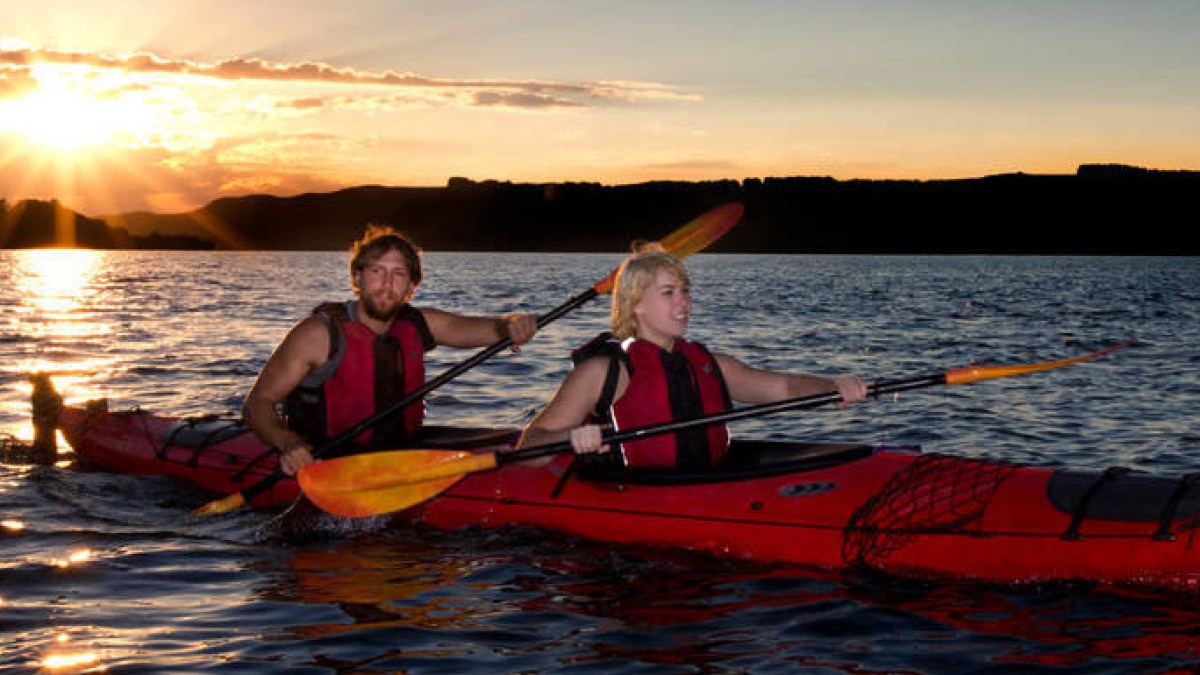 a small boat in a body of water