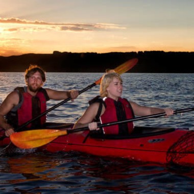 a small boat in a body of water