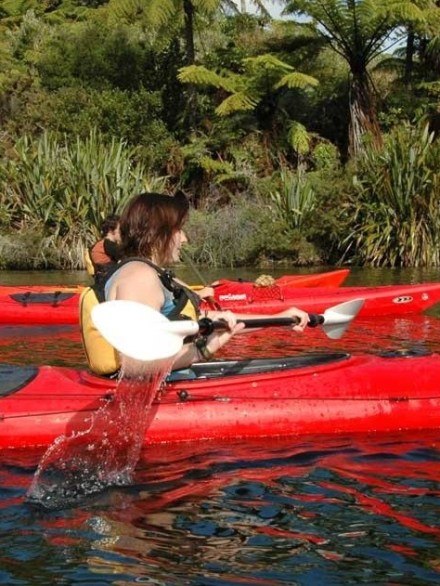 Kayaking – Ohau Channel Freedom Trip Image 1 a person sitting on a raft in a body of water