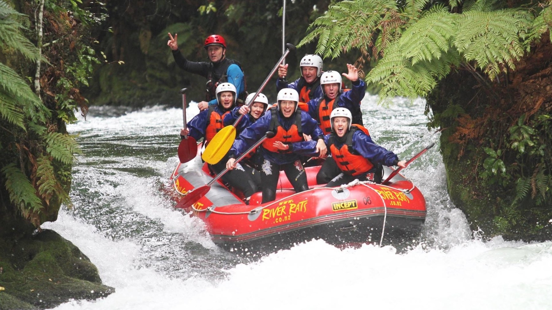 a man riding on a raft in the water